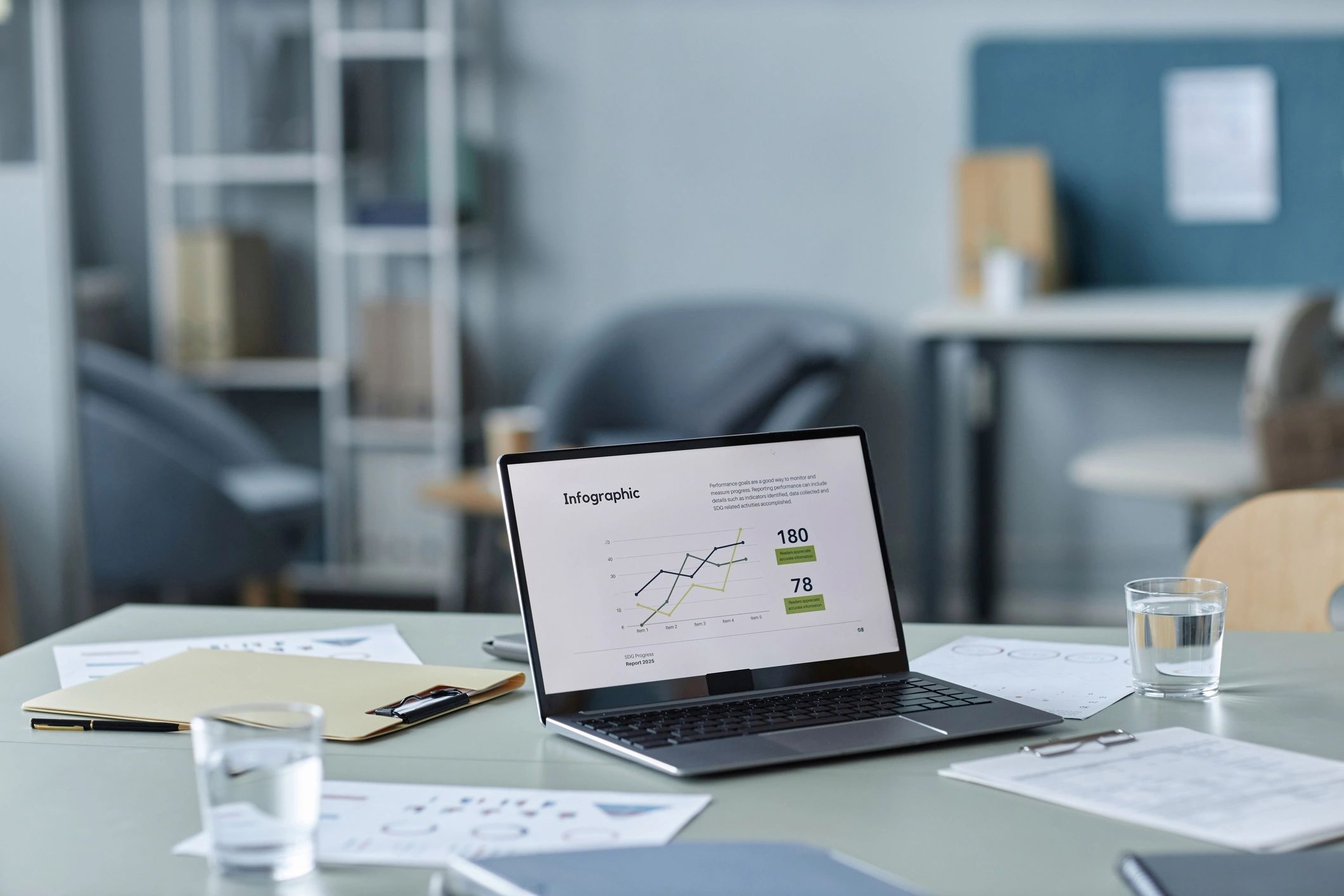 Laptop workspace used for planning custom website layouts
