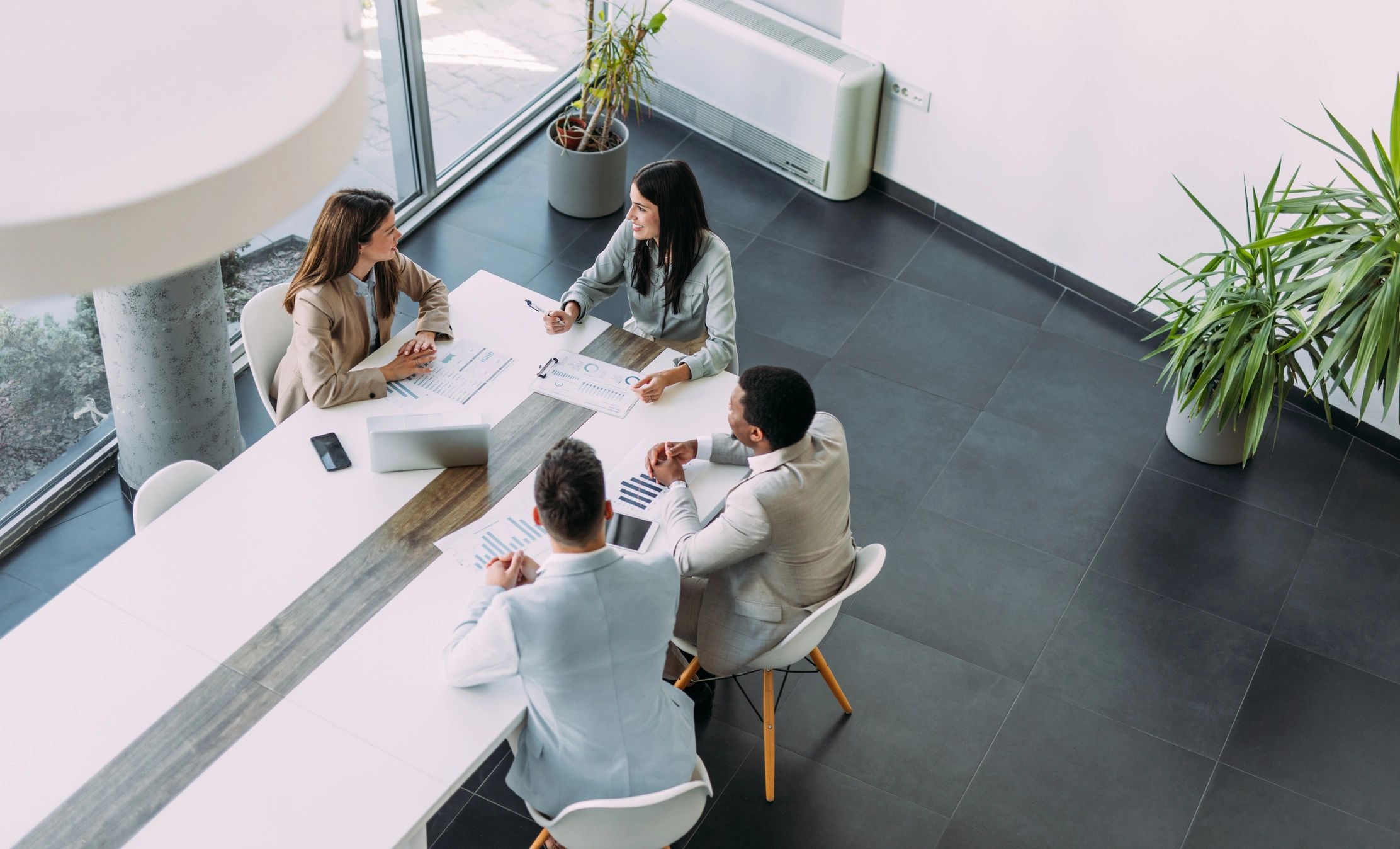 Business team meeting from above