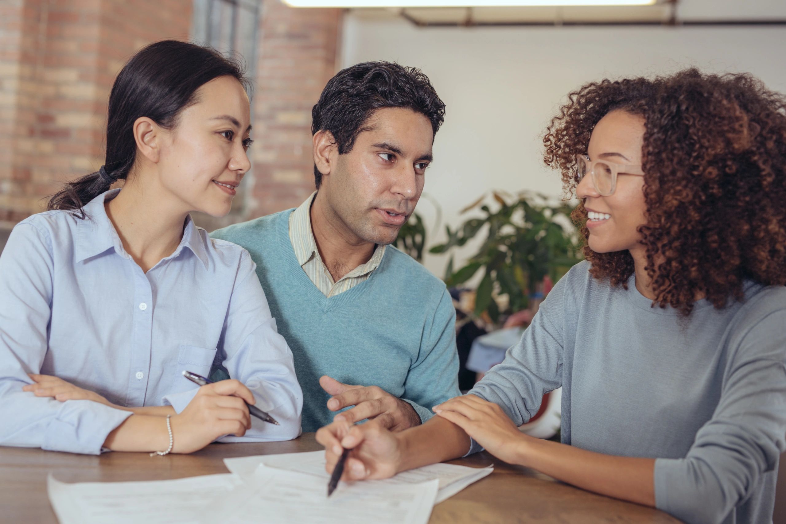 Clients signing a business agreement